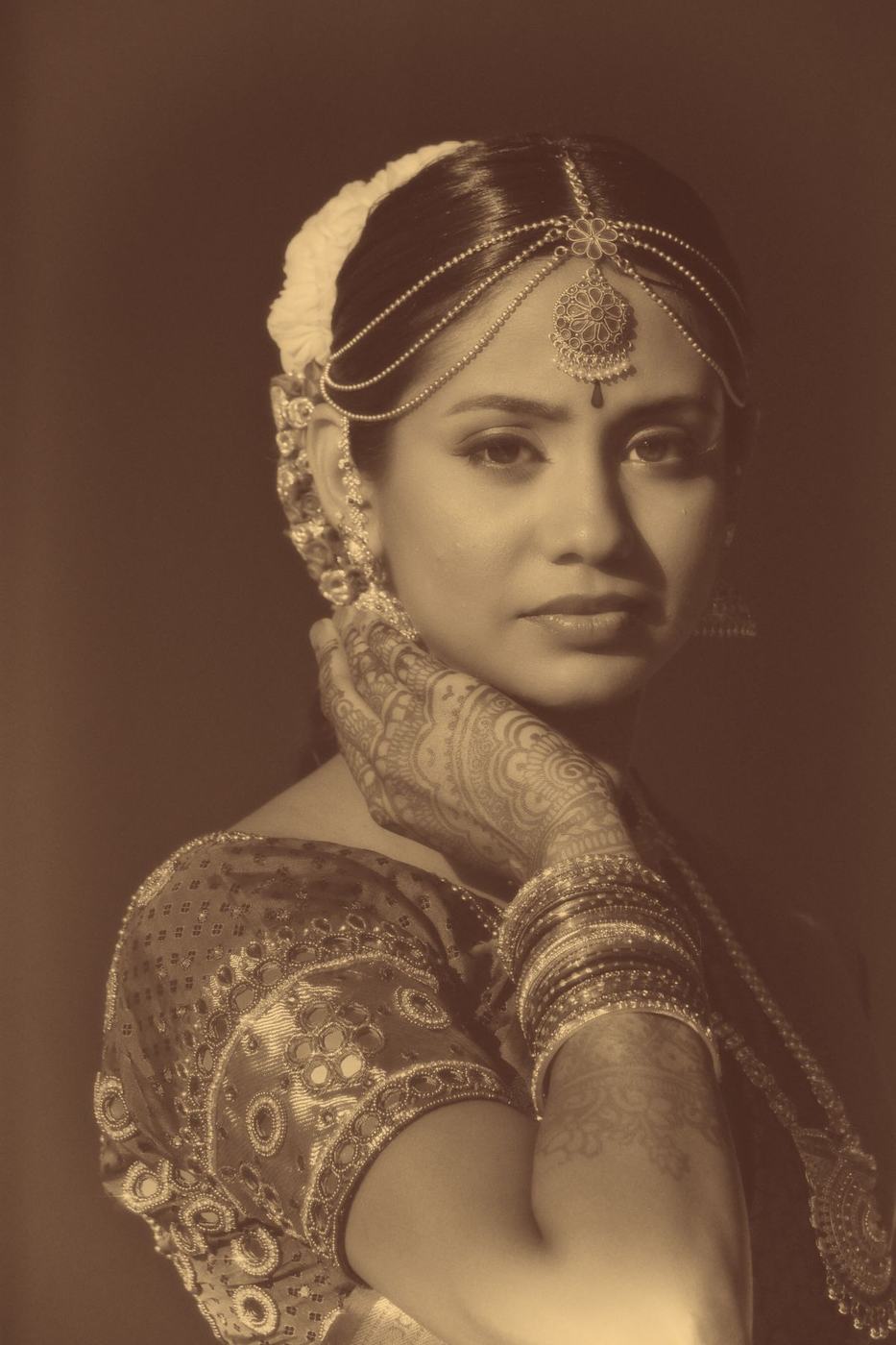 Bride in sepia with jasmine in her hair