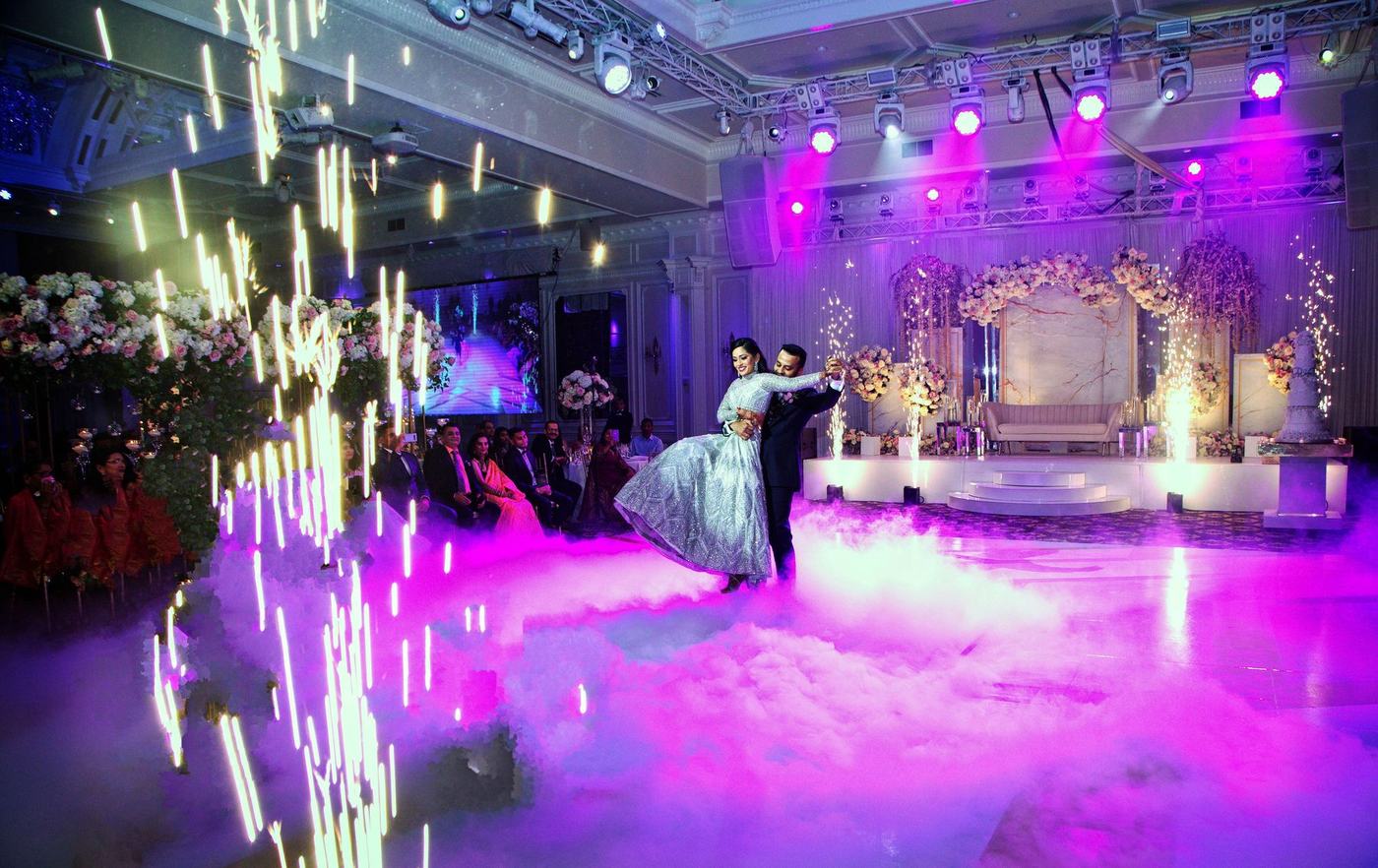 First dance in a rain of cold sparks and pink smoke